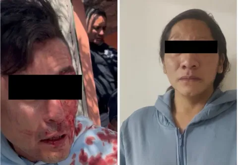 Intentaba arrojar a su bebé; policías lo impiden en Ecatepec.